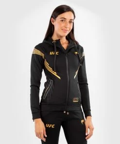 UFC Venum Fighters Authentic Fight Night Women's Walkout Hoodie - Champion 15 UFC Venum Fighters Authentic Fight Night Women's Walkout Hoodie - Champion -Venum Shop c 252Fe 252F2 252F3 252Fce23ff382ab2ff47afe77212155fa1bd4e254131 VNMUFC 00013 126 05 1 1